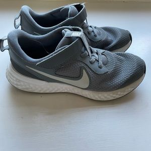 Excellent condition, minimally worn Nike Revolution, grey, size 2Y